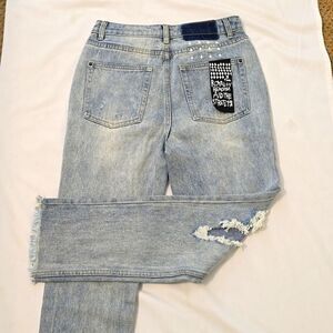 DESIGN SASA DISTRESSED JEANS SIZE MEDIUM.